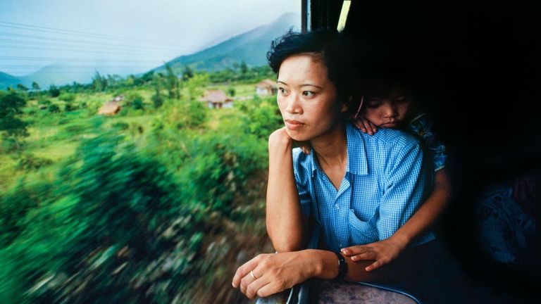 Karnow’s photograph of a teacher named Tran Thi Diep on the Thong Nhat train in 1990.