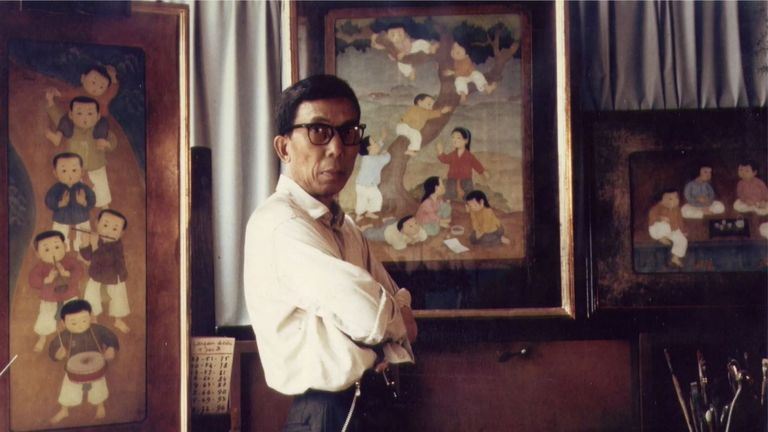 Portrait of artist Mai Trung Thu in the studio.