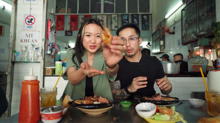 From left to right: Kavi and Peter having dodging beef at Bò Né Cô Tuyền | Source: Vietcetera