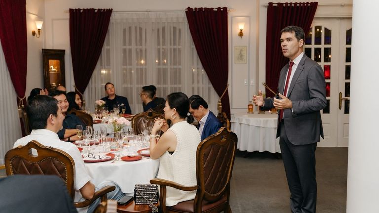 Philippe Giraud introduces the Alfred GIRAUD brand to a select guest at La Villa French Restaurant.