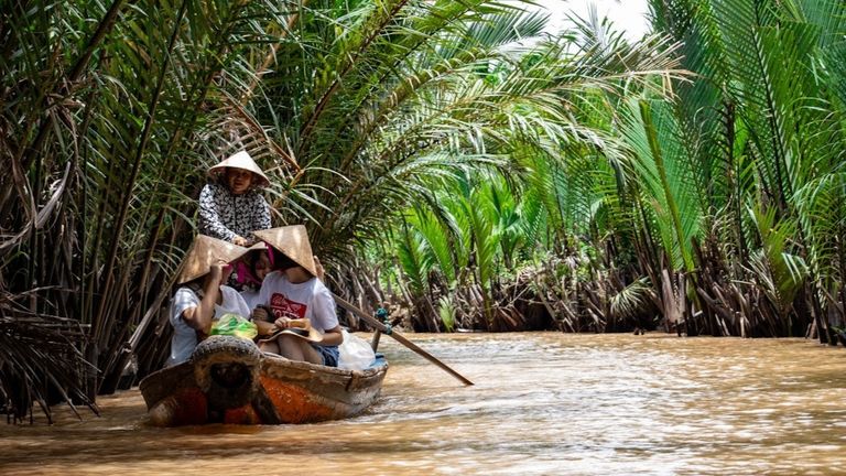 Experience local life by hand-rowed sampan (xuồng ba lá) through Mekong River | Source: Tomáš Malík for Unsplash