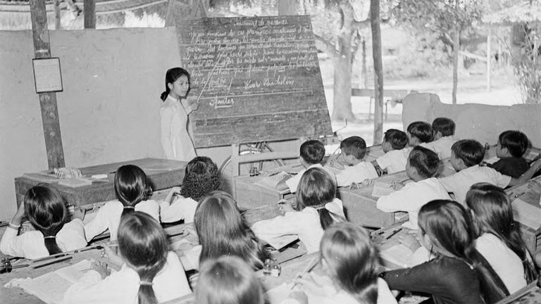 Class of Cao Dai religion, Tay Ninh in 1950s. | Source: Harrison Forman
