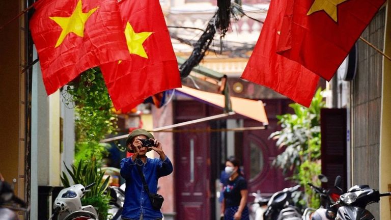 The streets are decorated with Vietnamese flags during festive national holidays. | Source: VnExpress