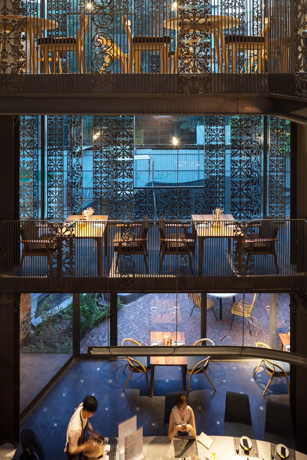 A night view of the Pizza 4P’s Phan Ke Binh another project that the pizza chain asked a Japanese architect to complete | Image Hoang Le Takashi Niwa The Japanese Architect In Tune With Culture And Nature7